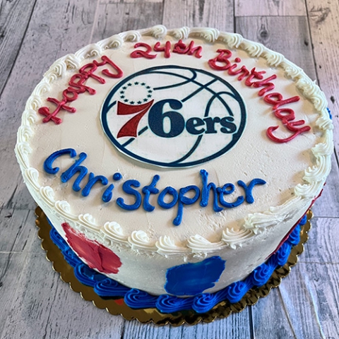 76ers themed birthday cake with writing that says Happy 24th Birthday Christopher