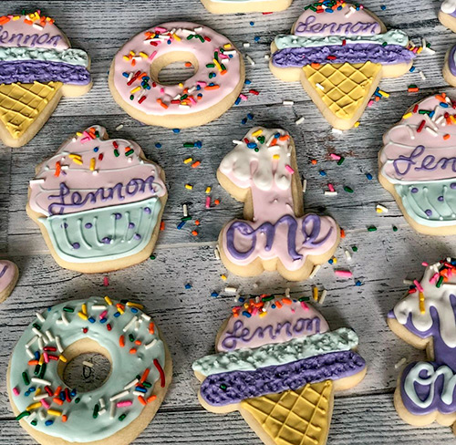 donuts, cupcake and ice cream cone decorated sugar cookies for Lennon first birthday