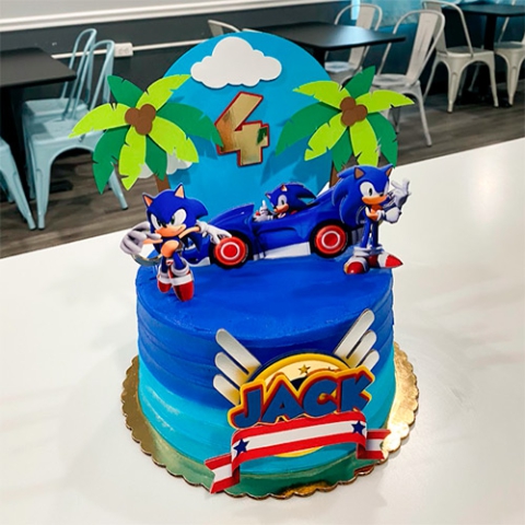A sonic the hedgehog themed round cake for Jack's 4th birthday