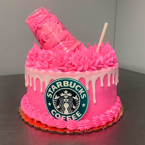 Pink cake with Starbucks Coffee logo on the side